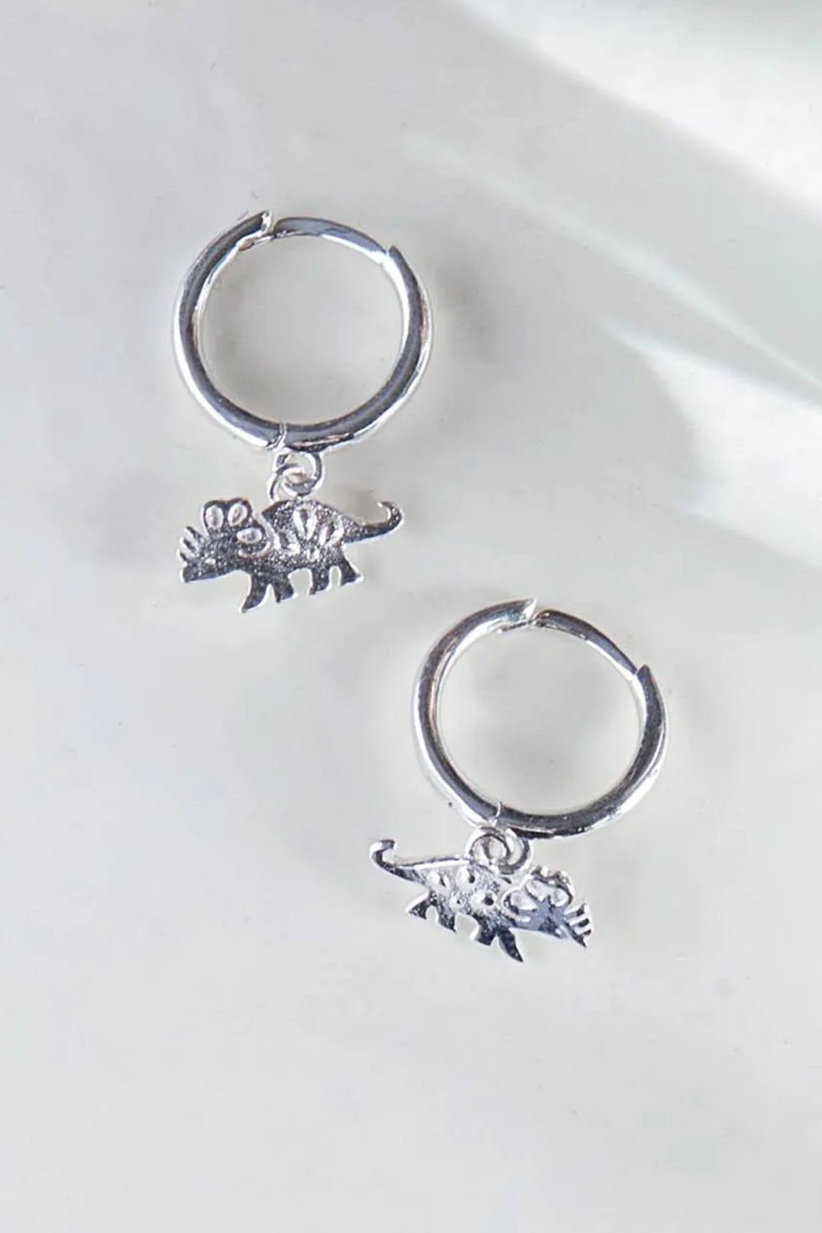 sterling-silver-triceratops-hoops-closeup