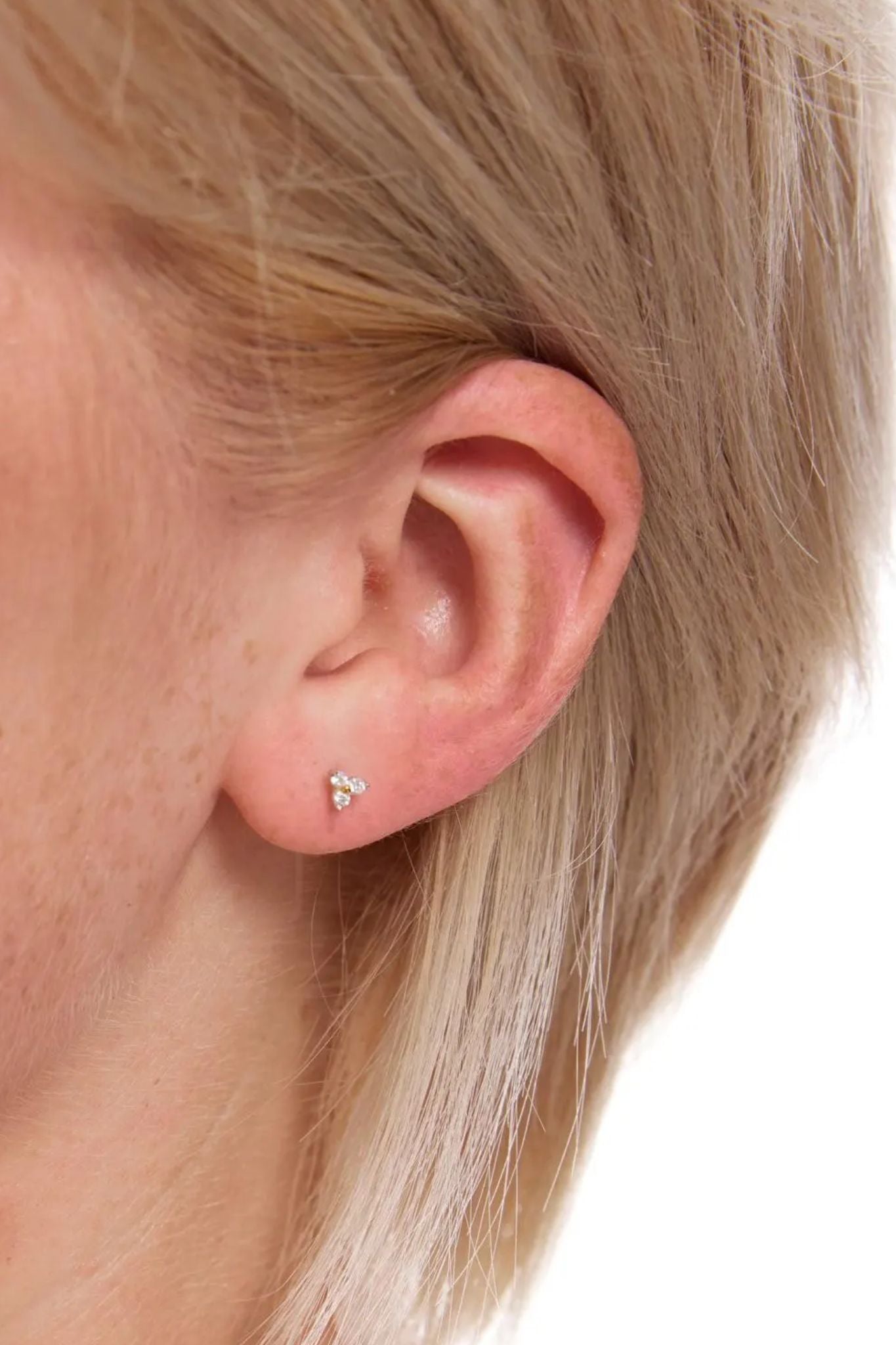 sterling-silver-cz-floral-trinity-tiny-stud-earrings-model