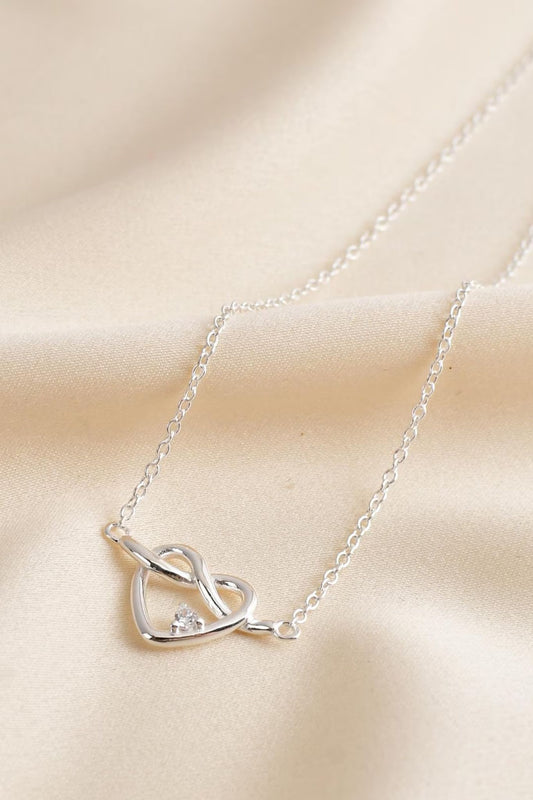 sterling-silver-cz-love-knot-necklace-wife-closeup