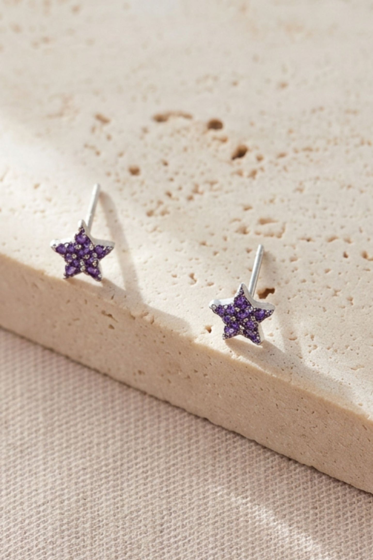 sterling-silver-sparkly-star-studs-in-silver-purple
