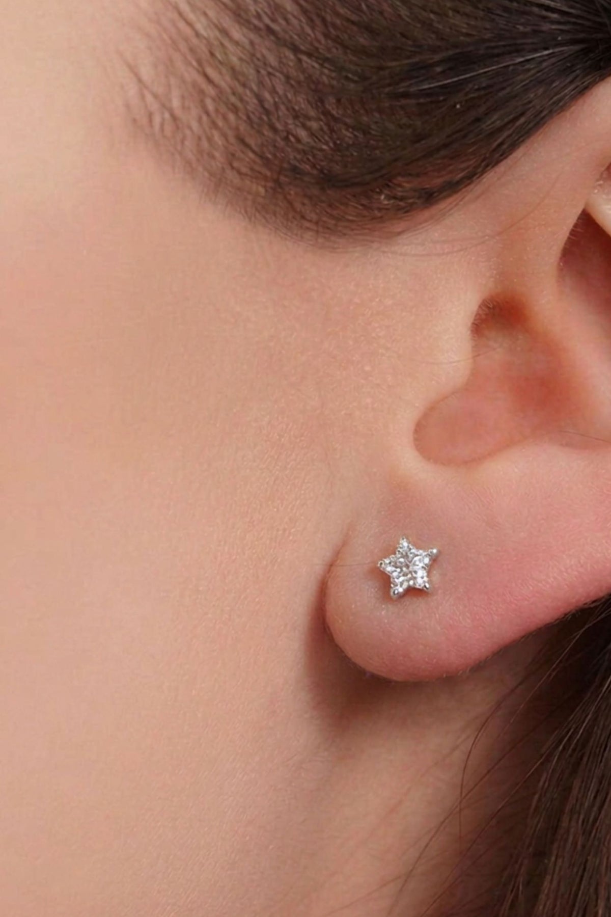 sterling-silver-sparkly-star-studs-in-silver-white-model