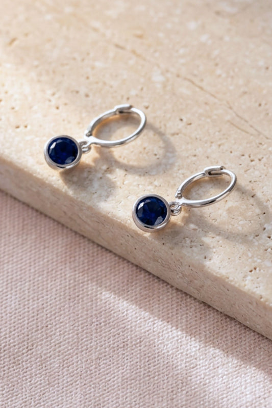 sterling-silver-cz-huggie-hoops-in-silver-midnight-blue