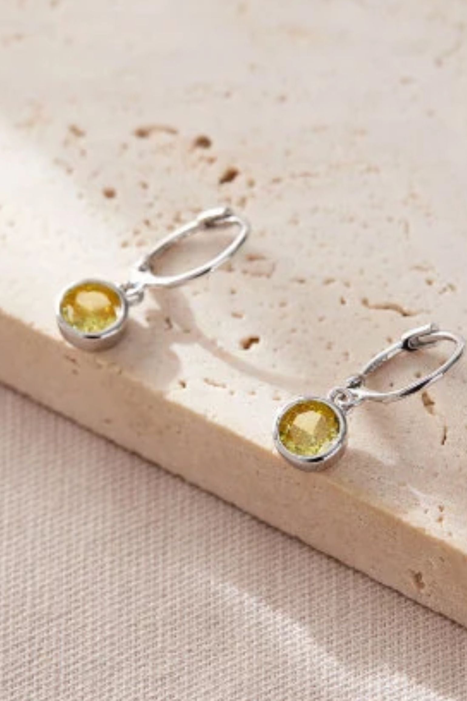 sterling-silver-cz-huggie-hoops-in-silver-yellow