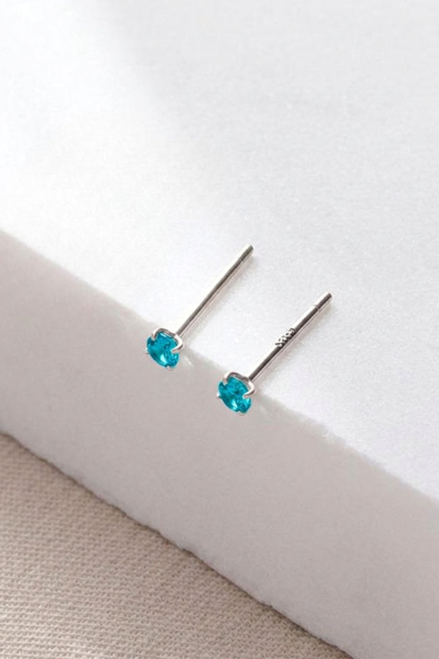 sterling-silver-cz-2-5mm-studs-in-silver-light-blue