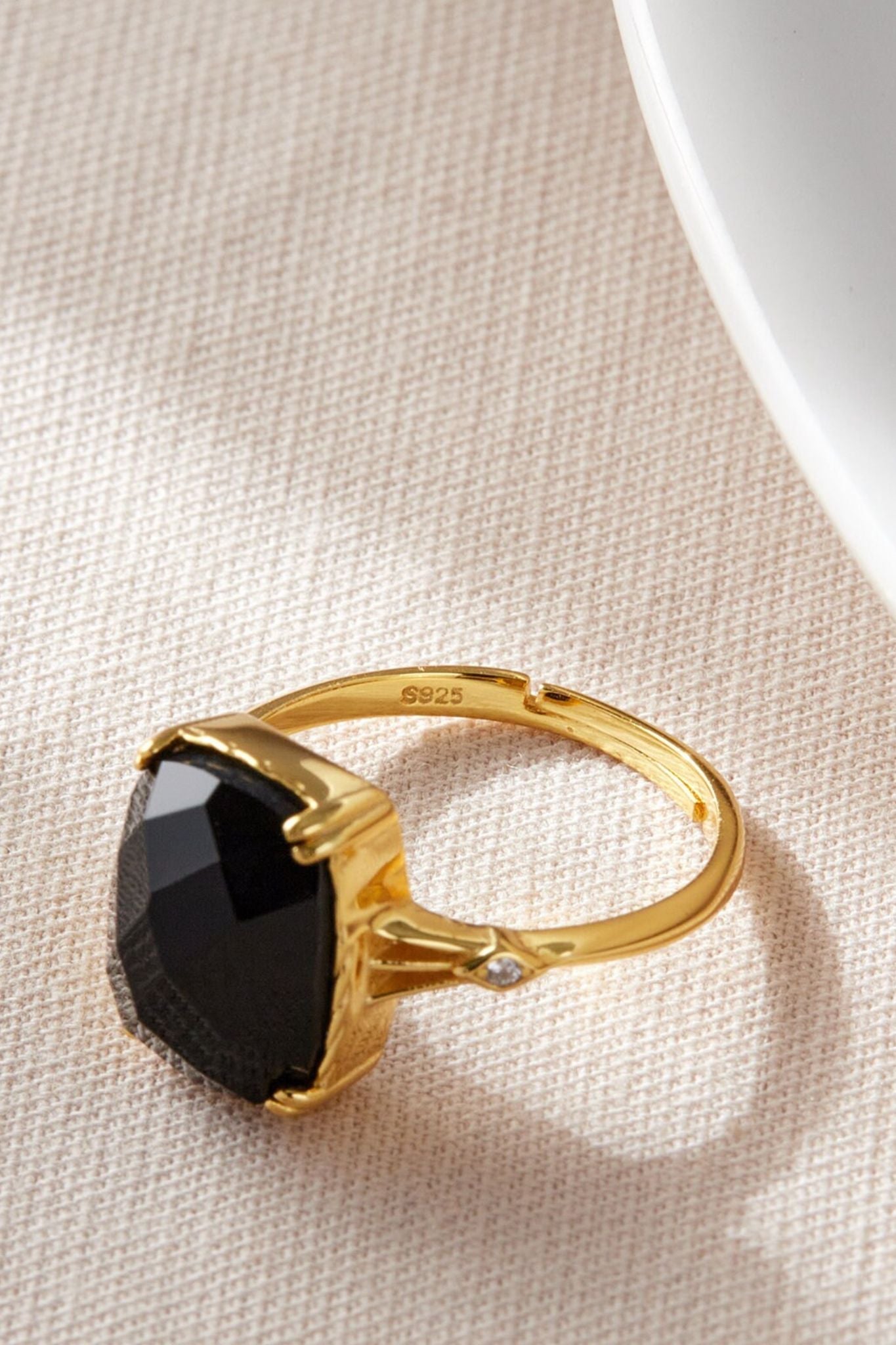 sterling-silver-black-zirconia-ring-lying-flat