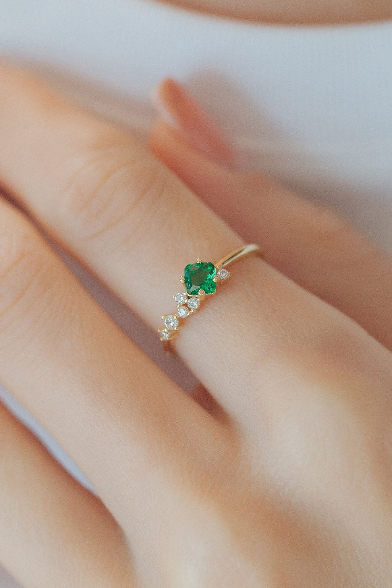 sterling-silver-cz-emerald-green-ring-model-finger