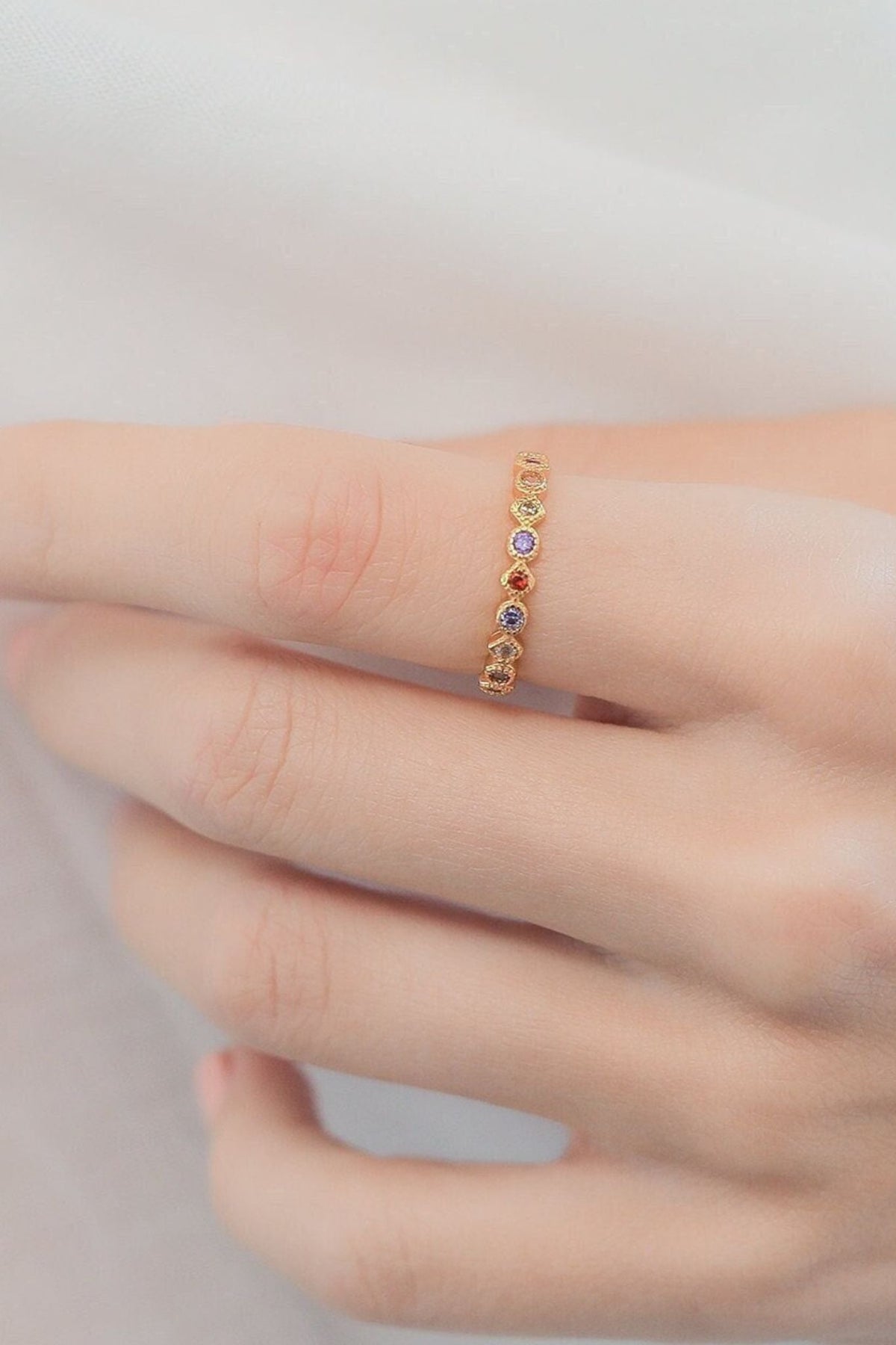 sterling-silver-cz-rainbow-ring-model-finger