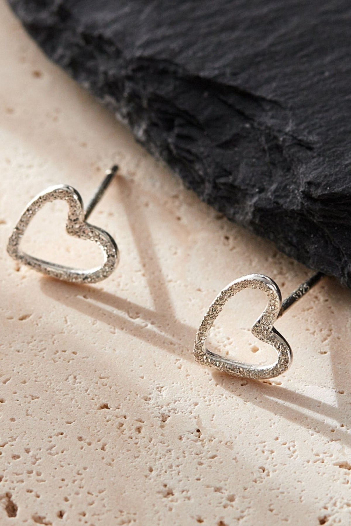 sterling-silver-frosted-open-heart-stud-earrings-closeup