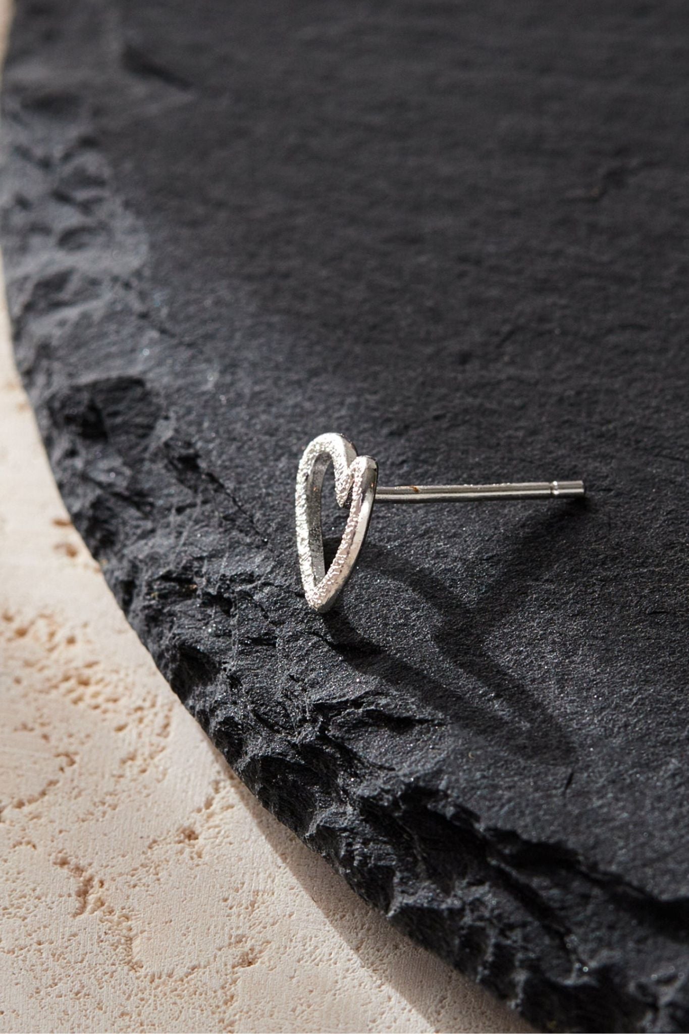 sterling-silver-frosted-open-heart-stud-earrings-side-view