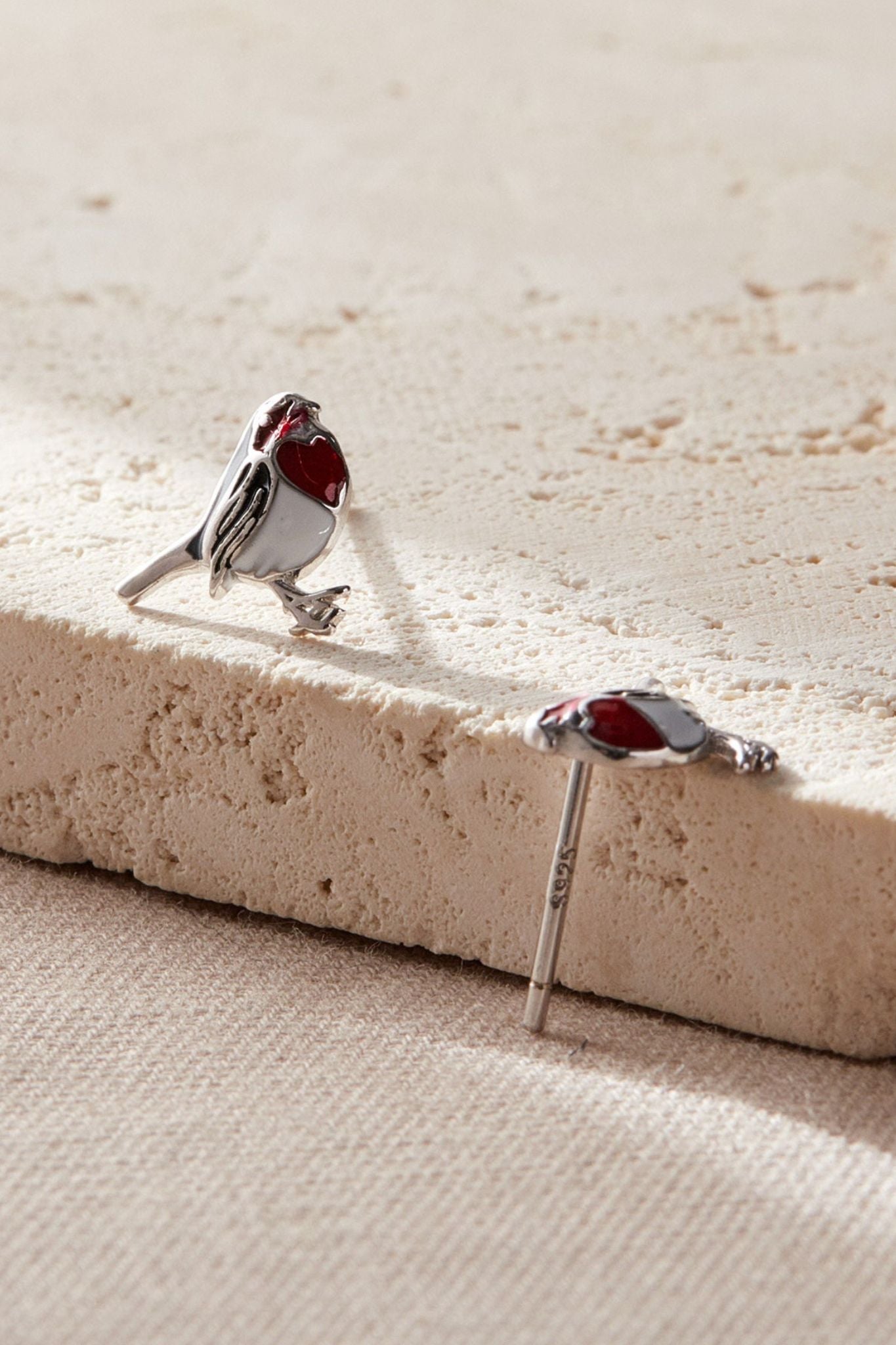 sterling-silver-red-robin-studs-in-silver-closeup