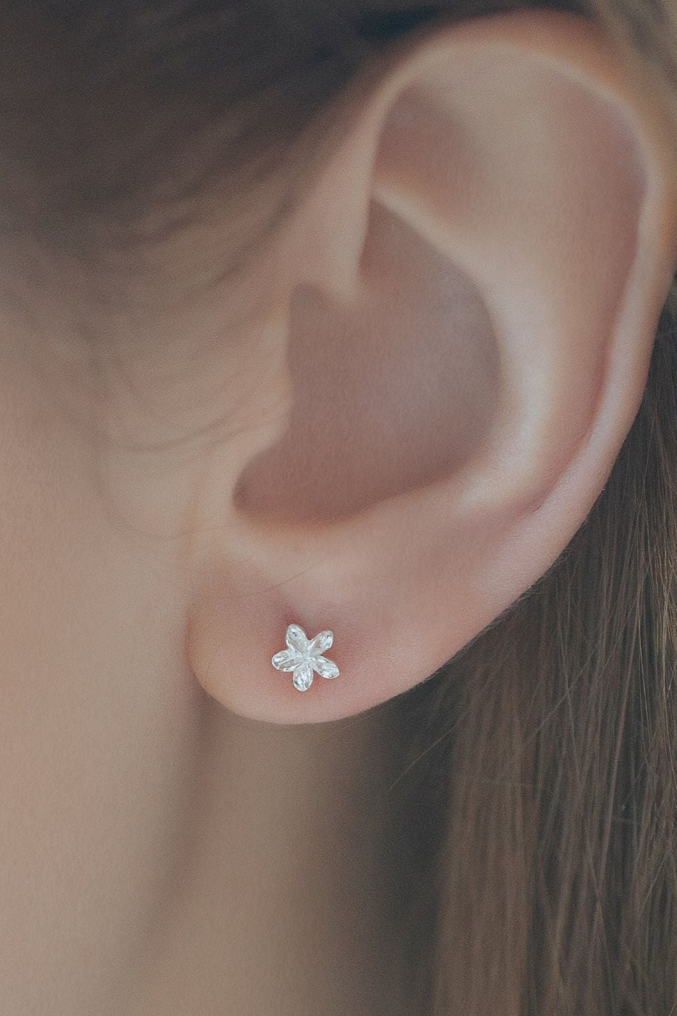 sterling-silver-dainty-flower-stud-earrings-model