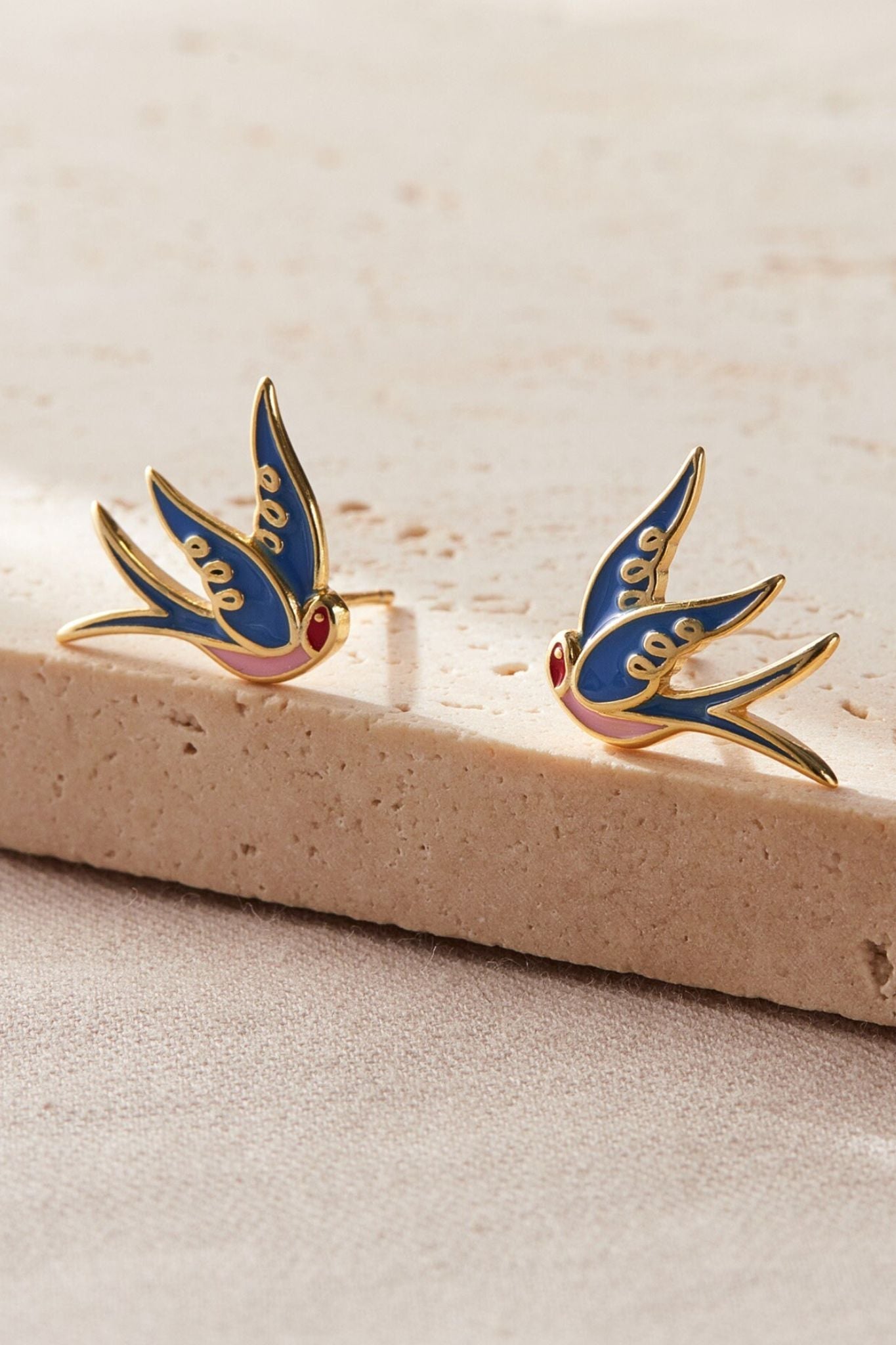 sterling-silver-blue-swallow-studs-in-gold
