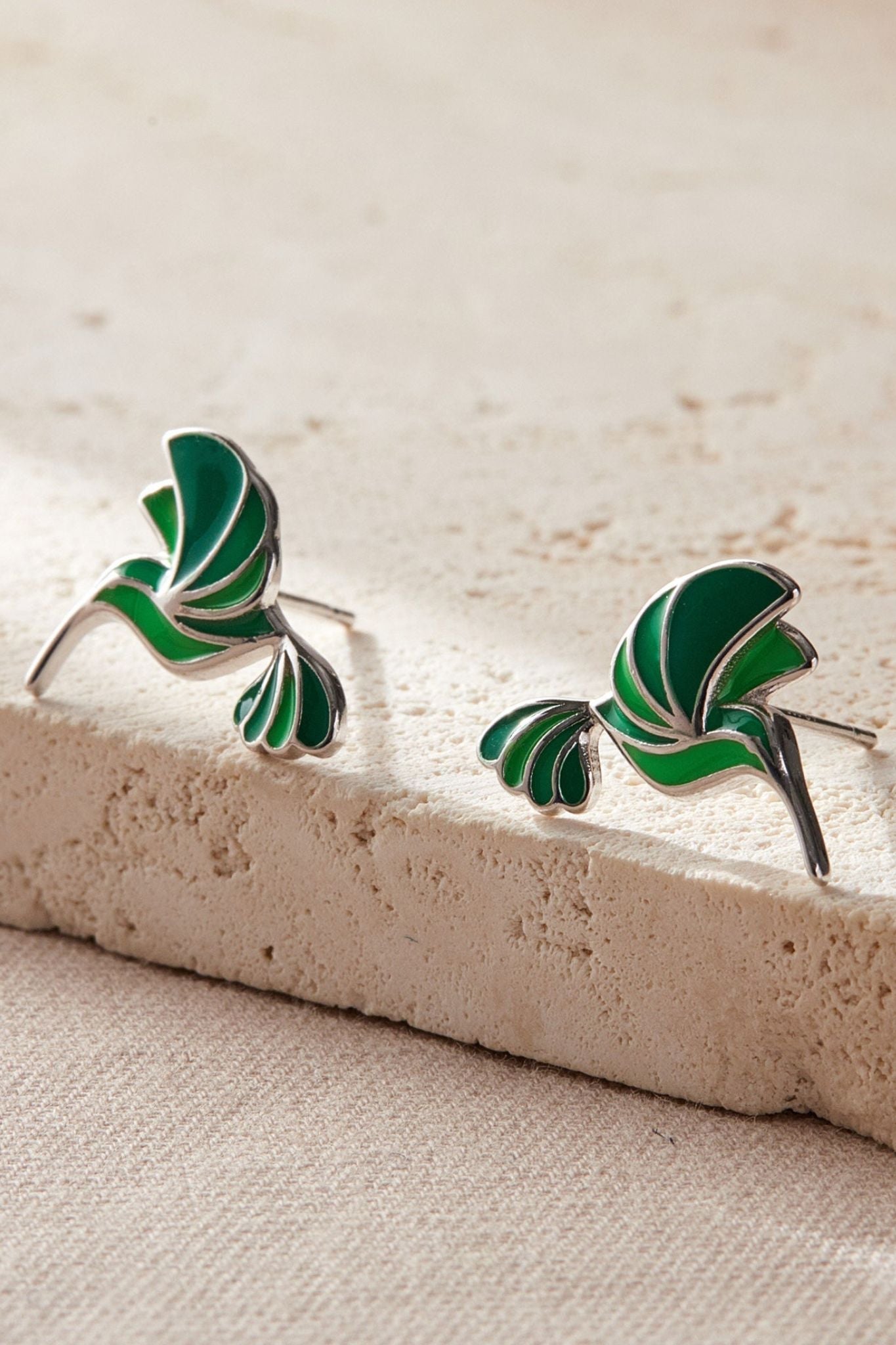 sterling-silver-green-hummingbird-studs-in-silver-closeup