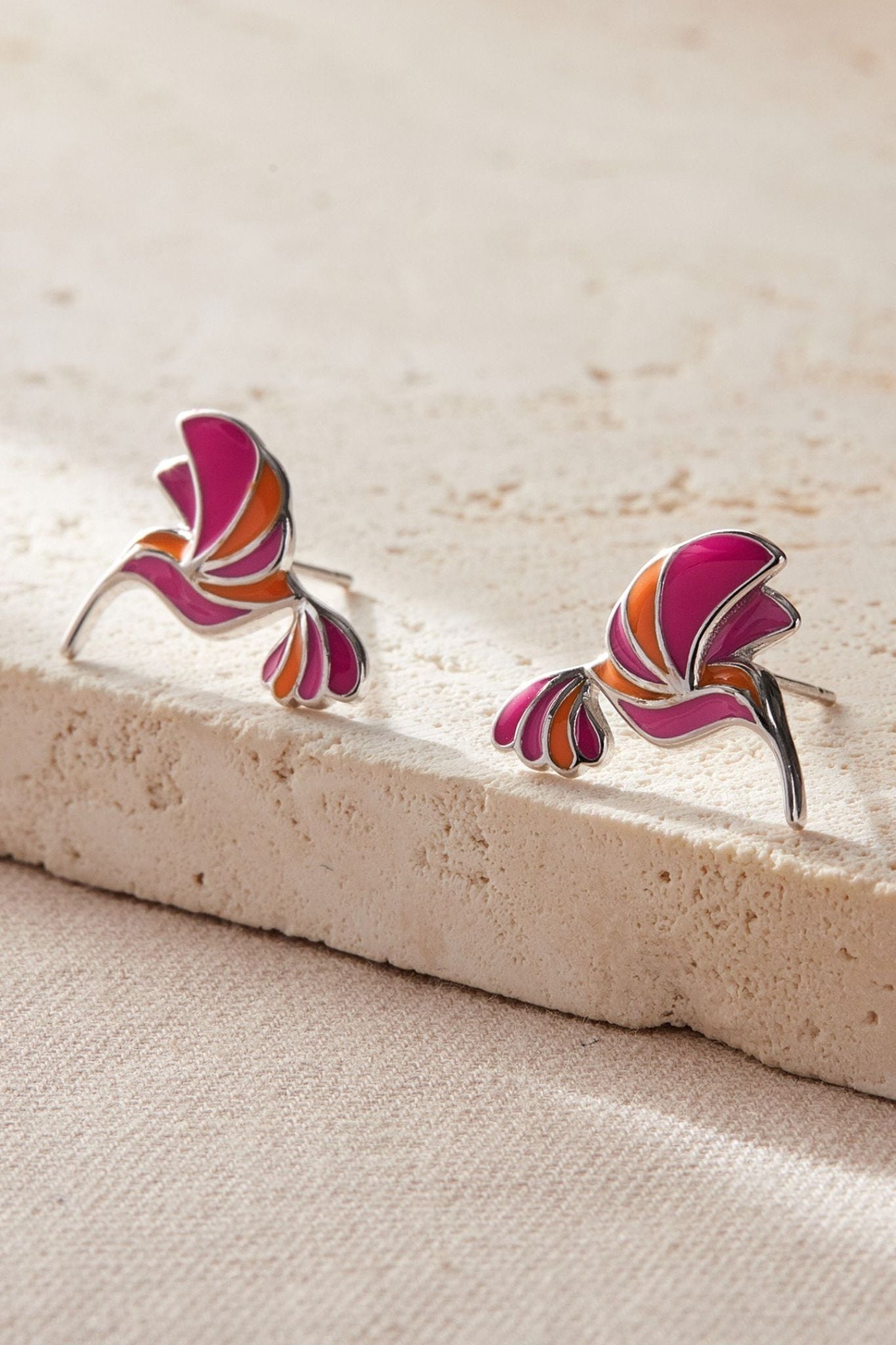 sterling-silver-pink-hummingbird-studs-in-silver-closeup