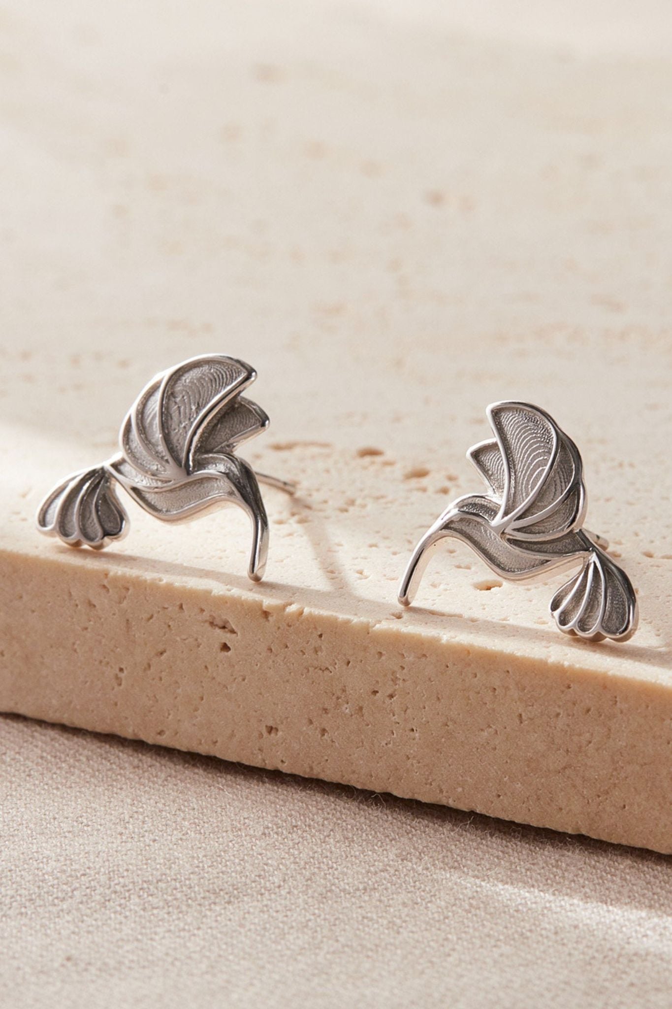 sterling-silver-hummingbird-studs-in-silver-closeup