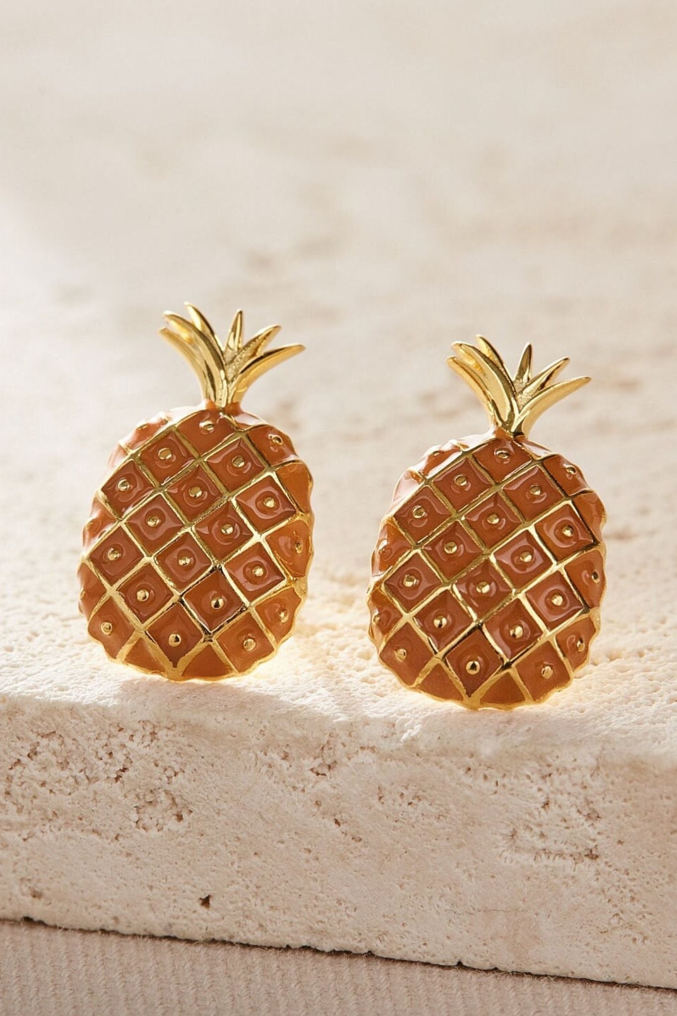 sterling-silver-pineapple-studs-in-gold-closeup