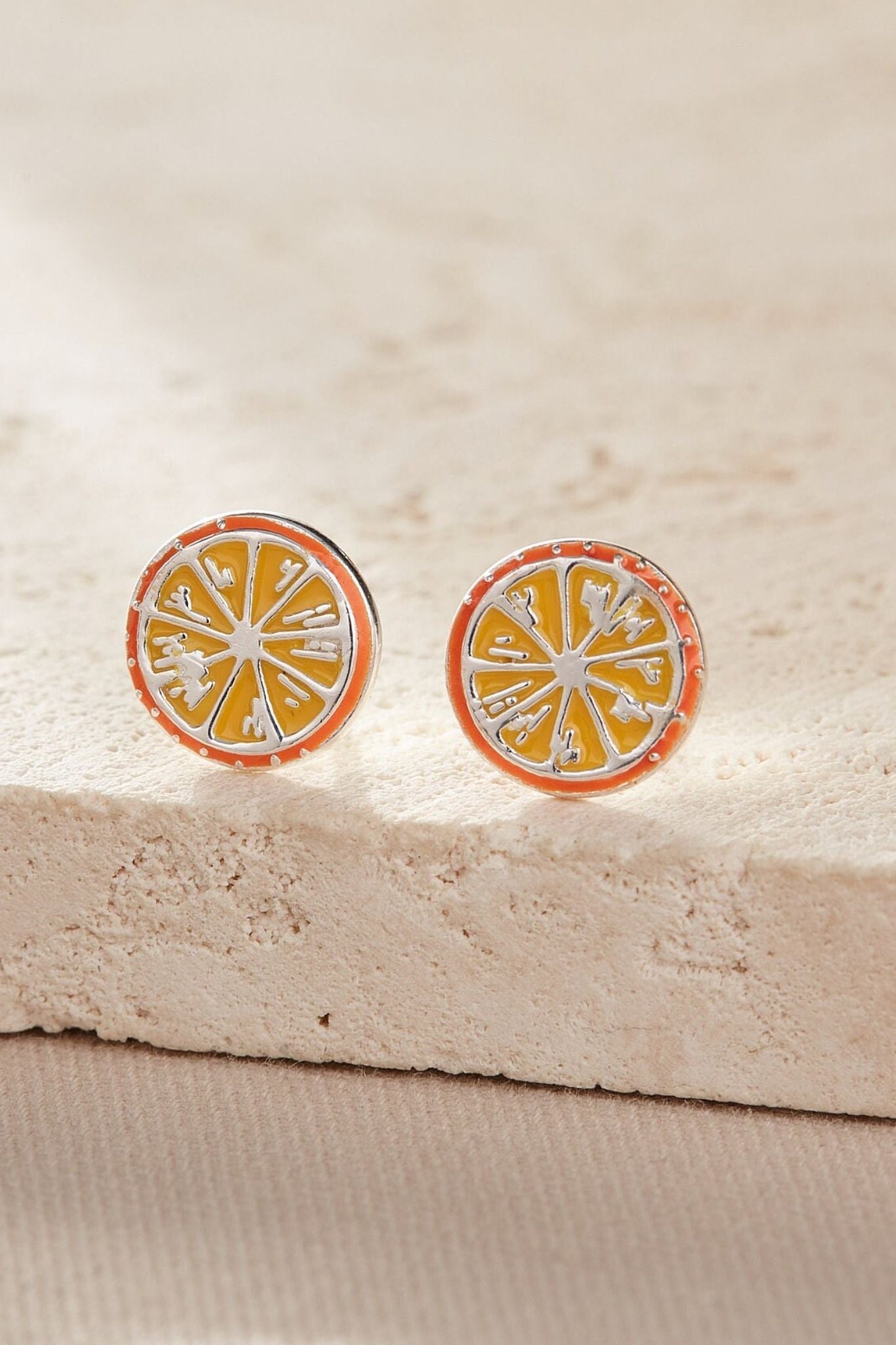 sterling-silver-orange-slice-studs-in-silver-closeup