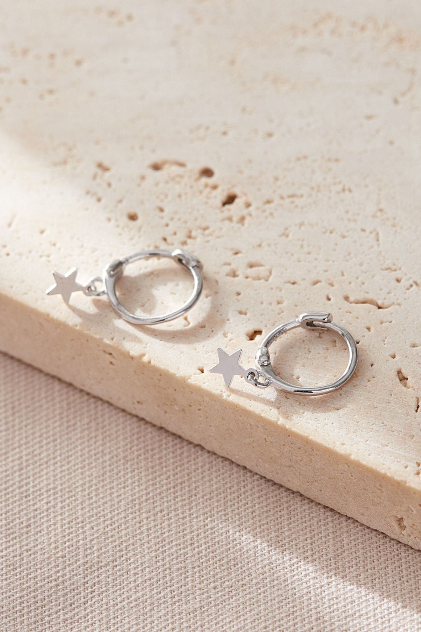 sterling-silver-star-charm-hoops-birthday-latch-closure
