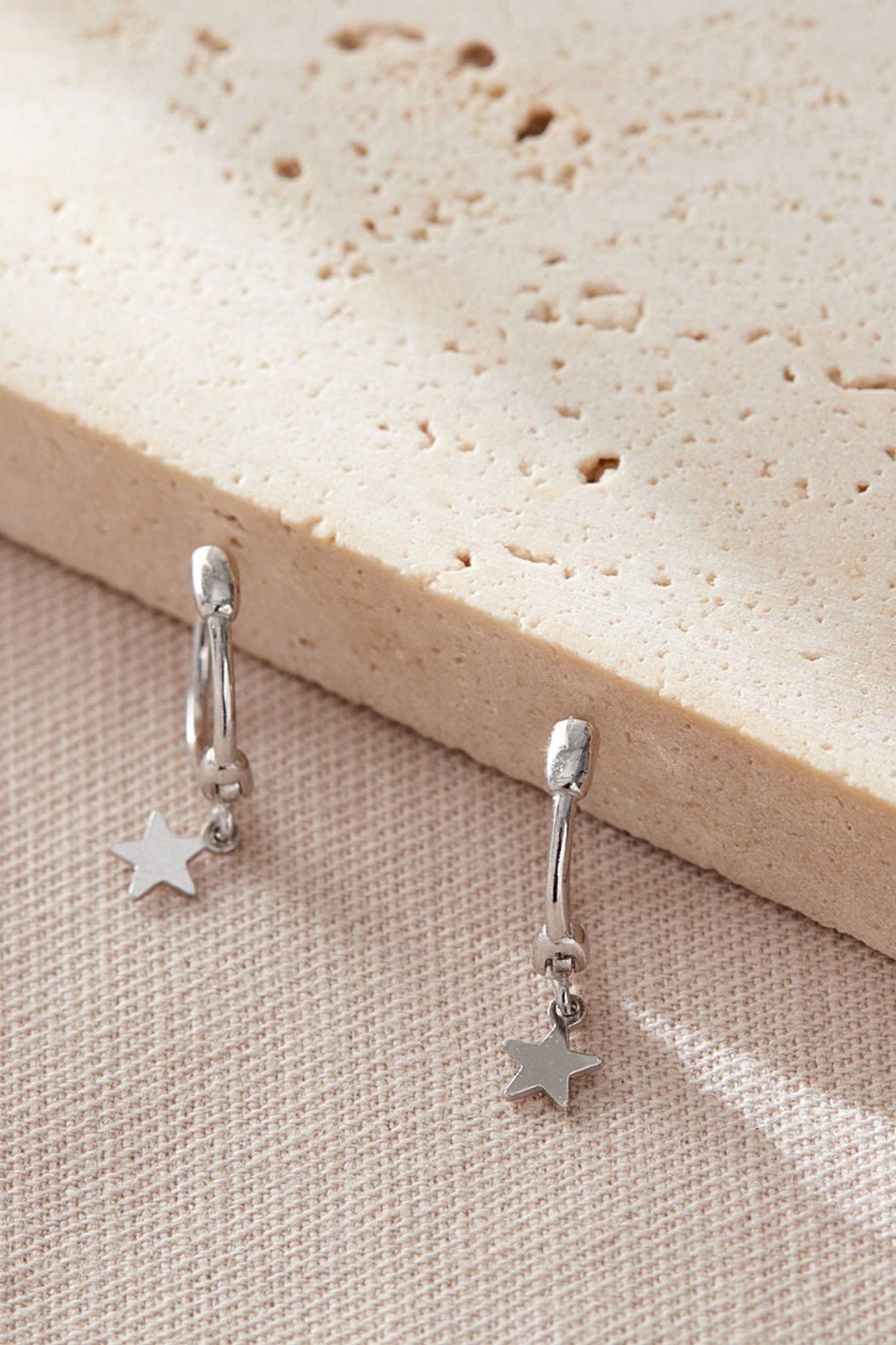 sterling-silver-star-charm-hoops-birthday-closeup