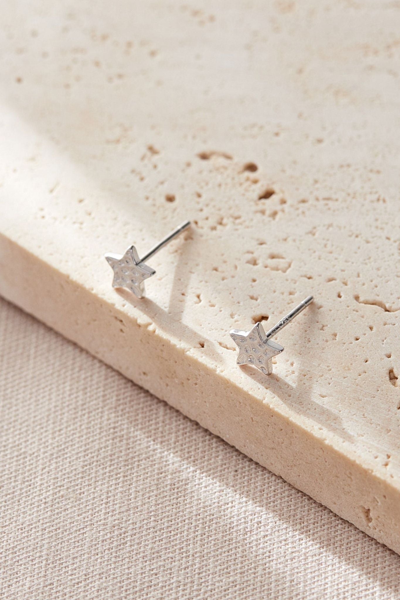 sterling-silver-hammered-star-studs-6mm-in-silver