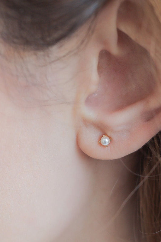 sterling-silver-pearl-studs-4mm-in-gold-model
