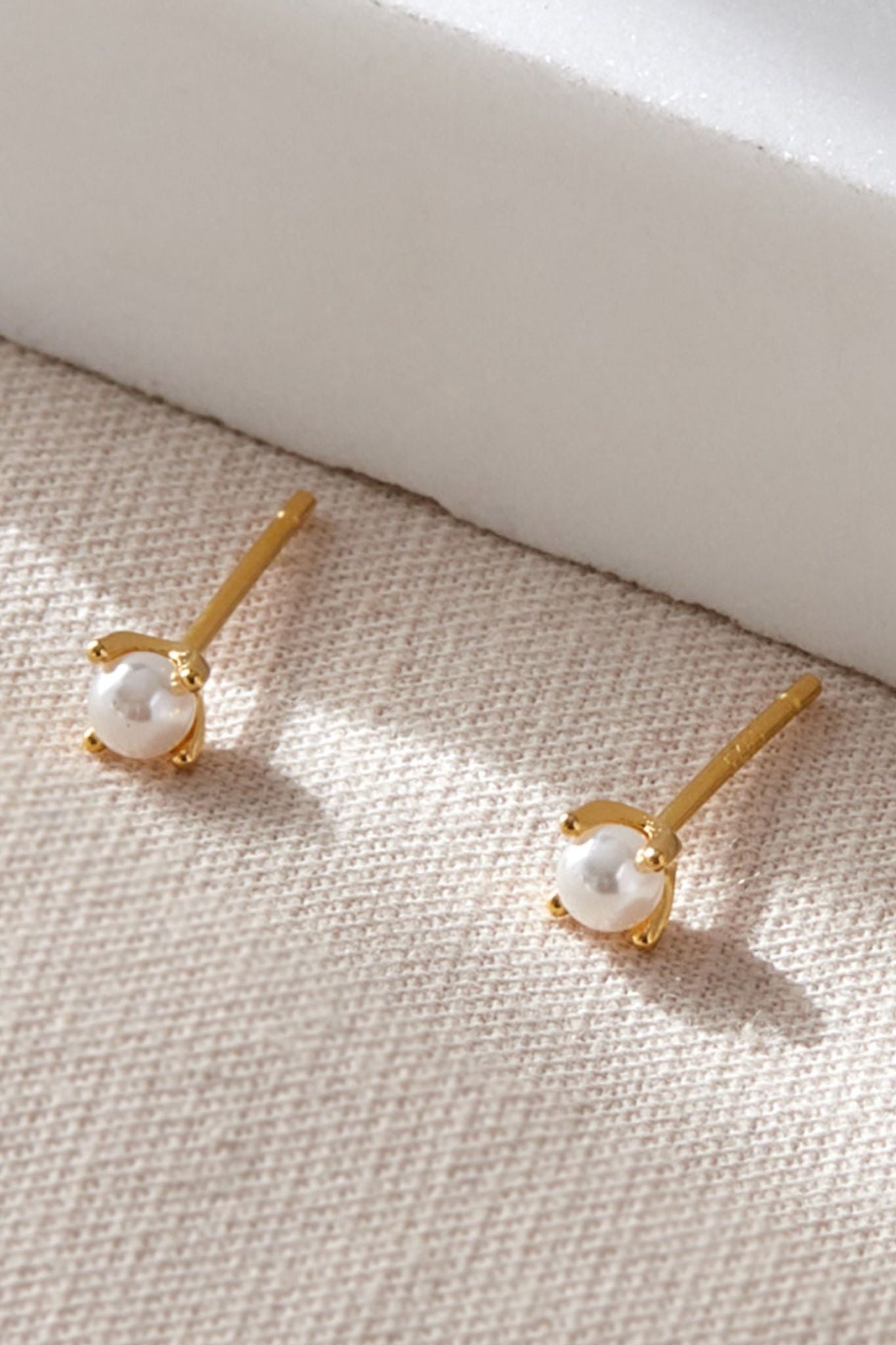 sterling-silver-pearl-studs-4mm-in-gold
