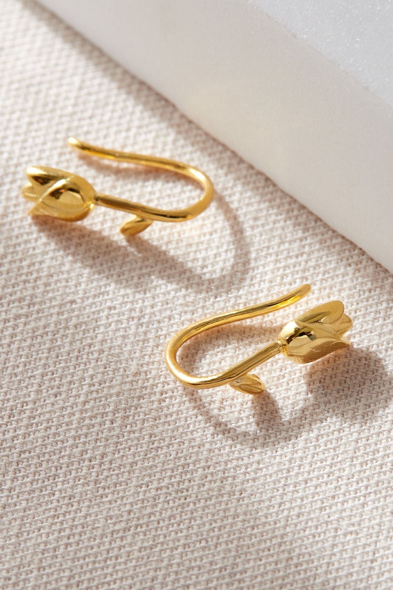 sterling-silver-tulip-hooks-in-gold-closeup