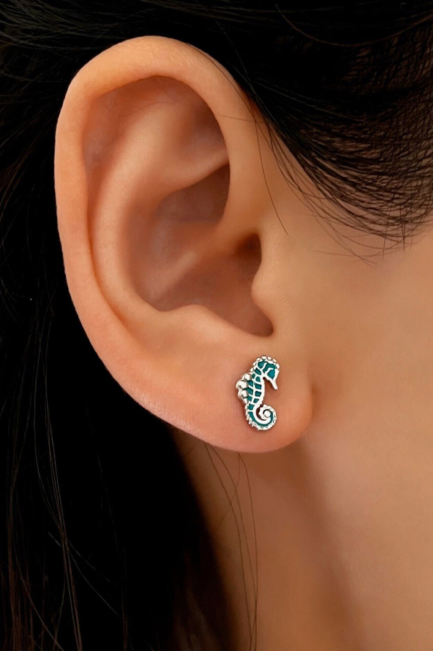 sterling-silver-seahorse-studs-in-silver-model