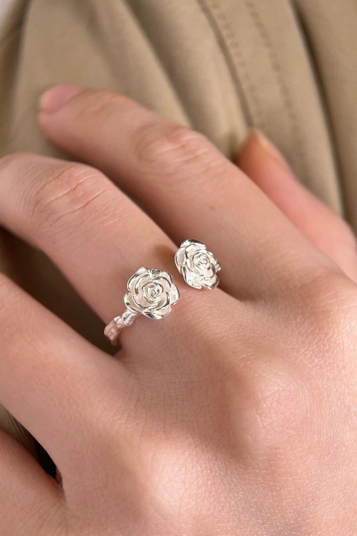 sterling-silver-rose-open-ring-model-waearing