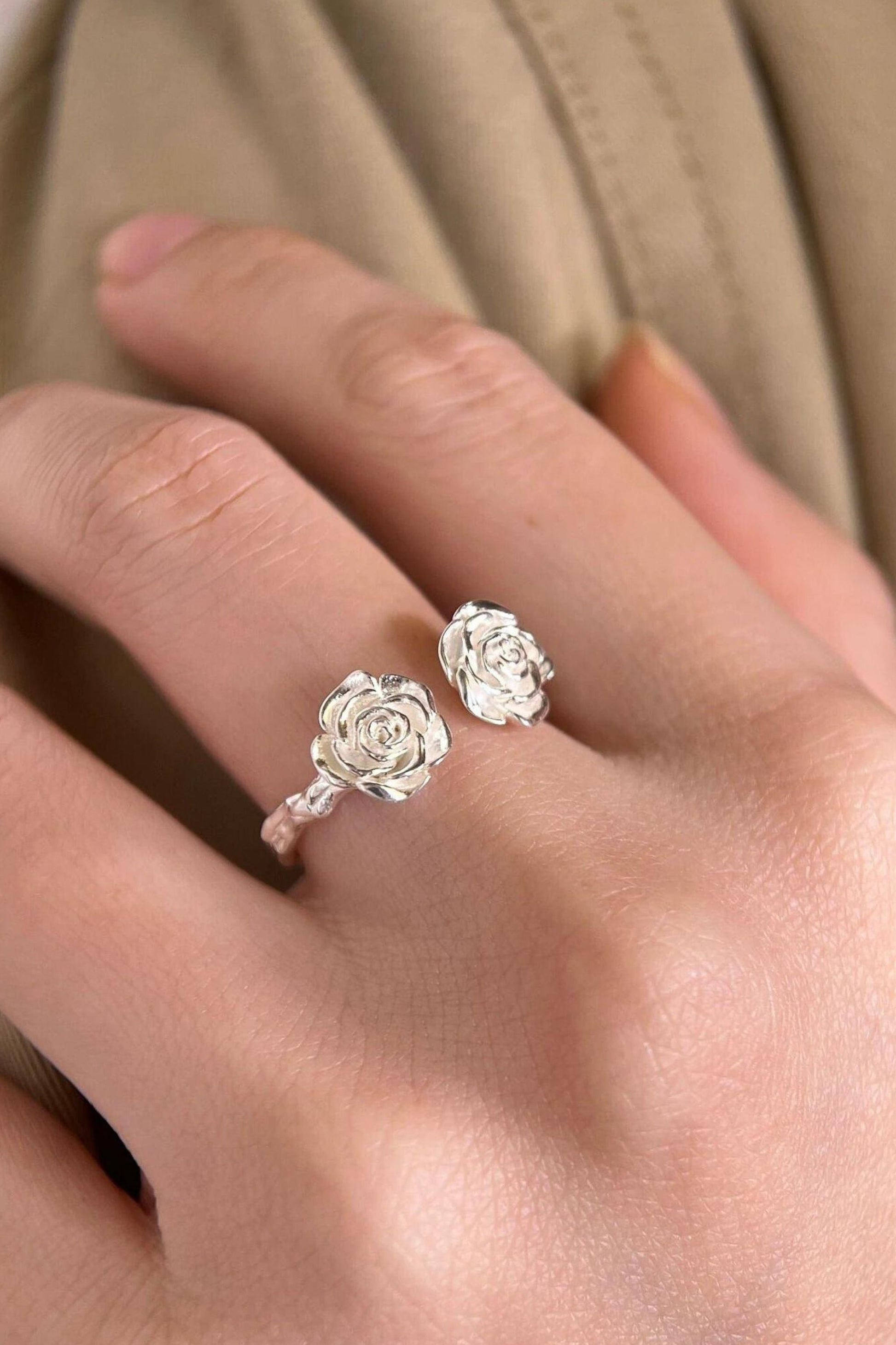 sterling-silver-rose-open-ring-model-waearing