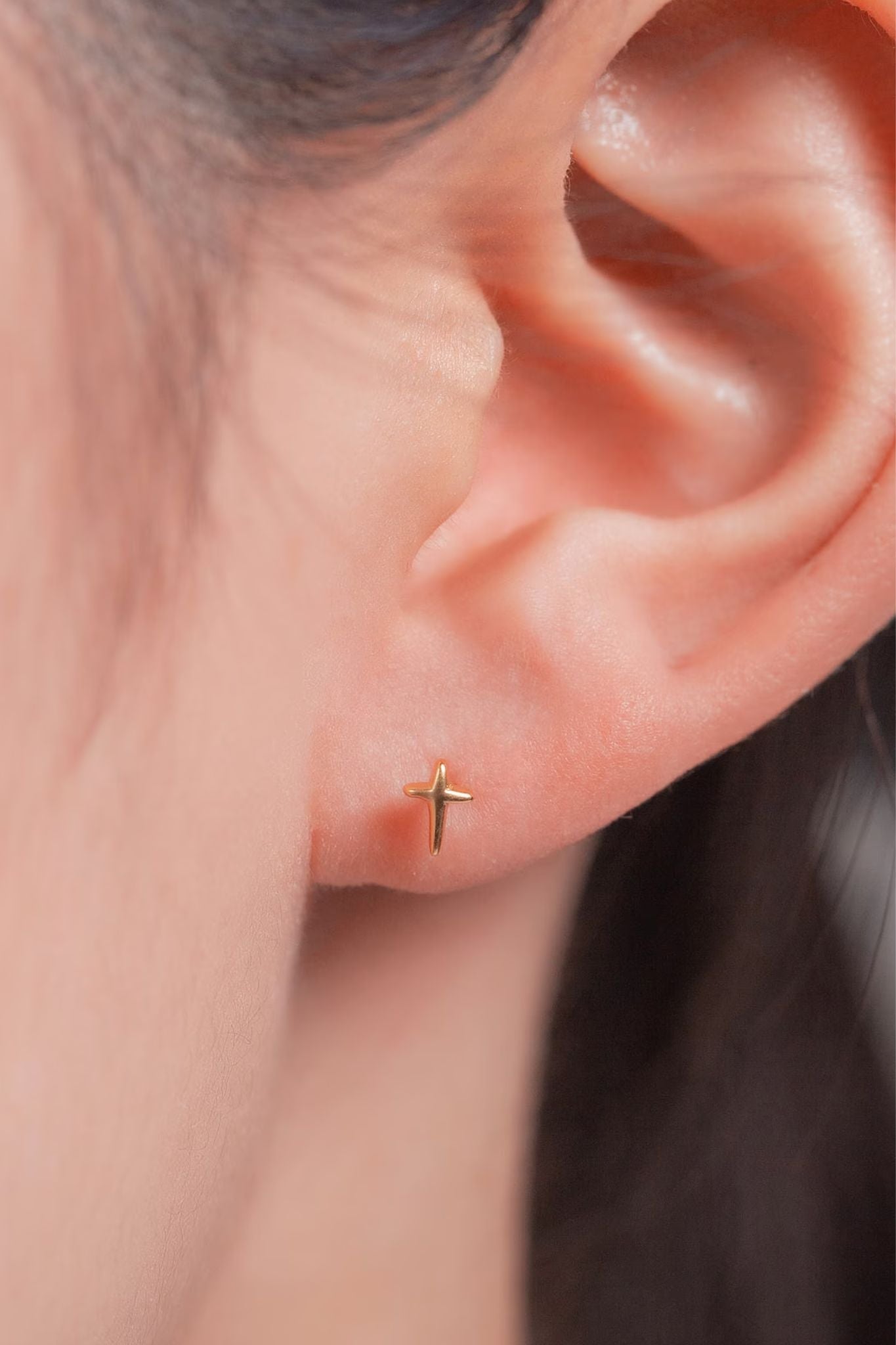 sterling-silver-tiny-cross-studs-in-gold-model