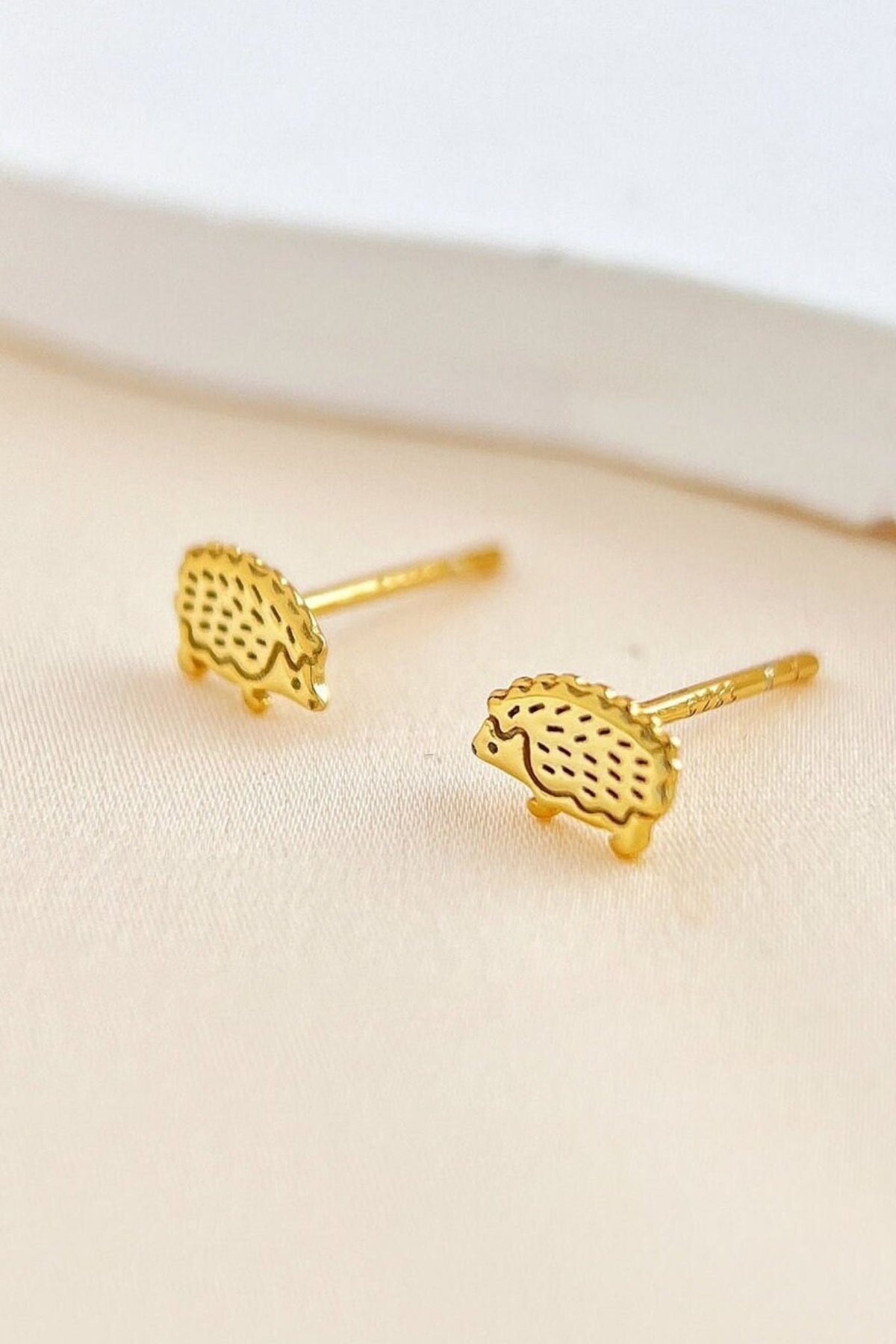 sterling-silver-tiny-hedgehog-studs-in-gold