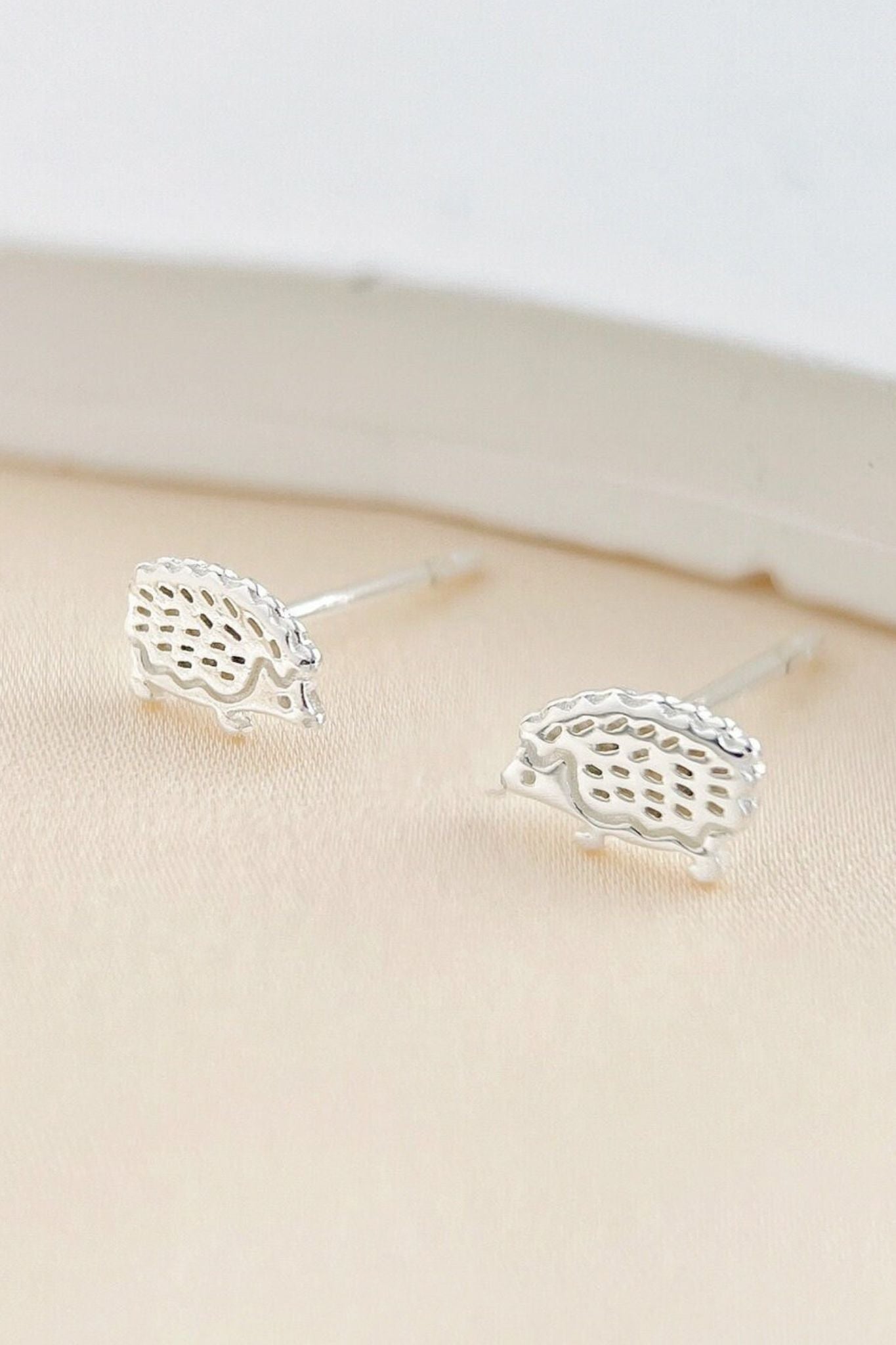 sterling-silver-tiny-hedgehog-studs-in-silver