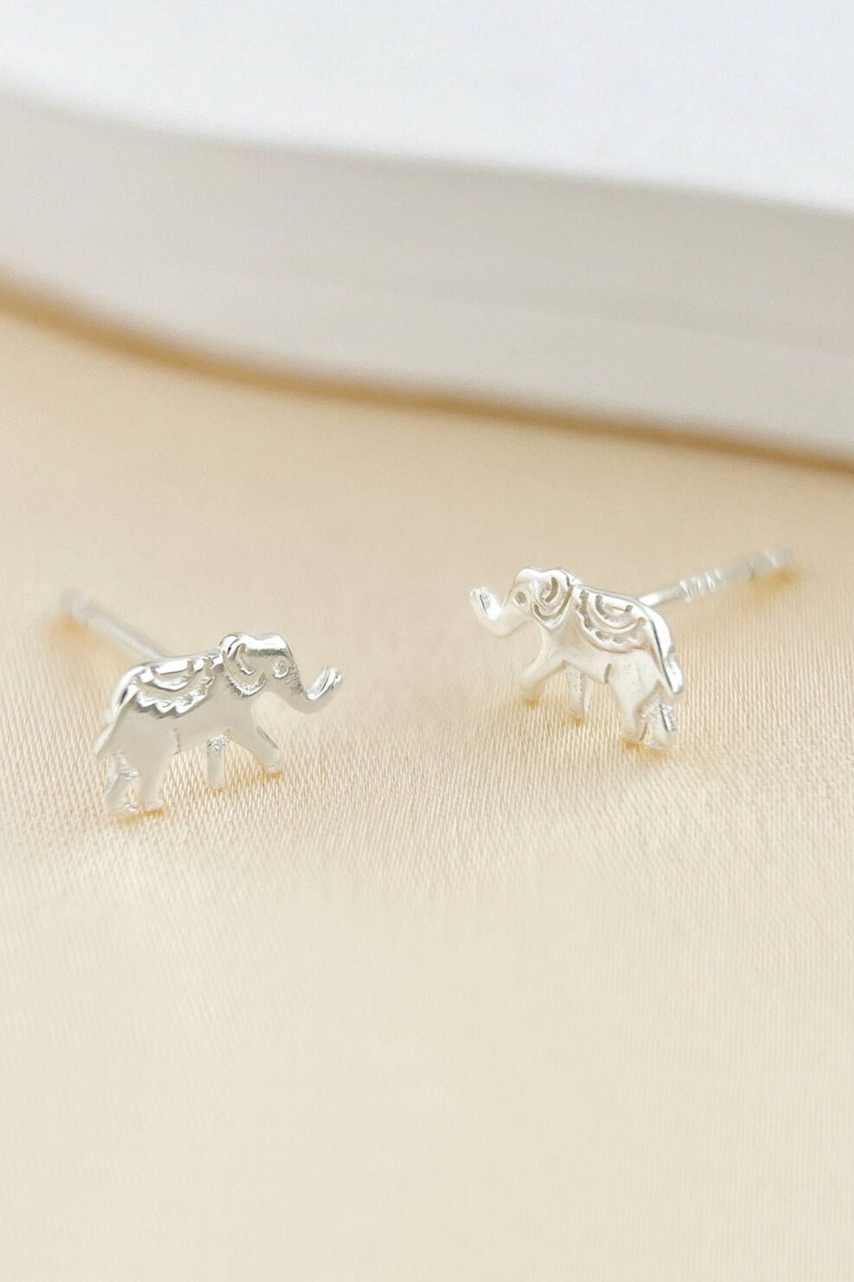 sterling-silver-tiny-elephant-studs-in-silver