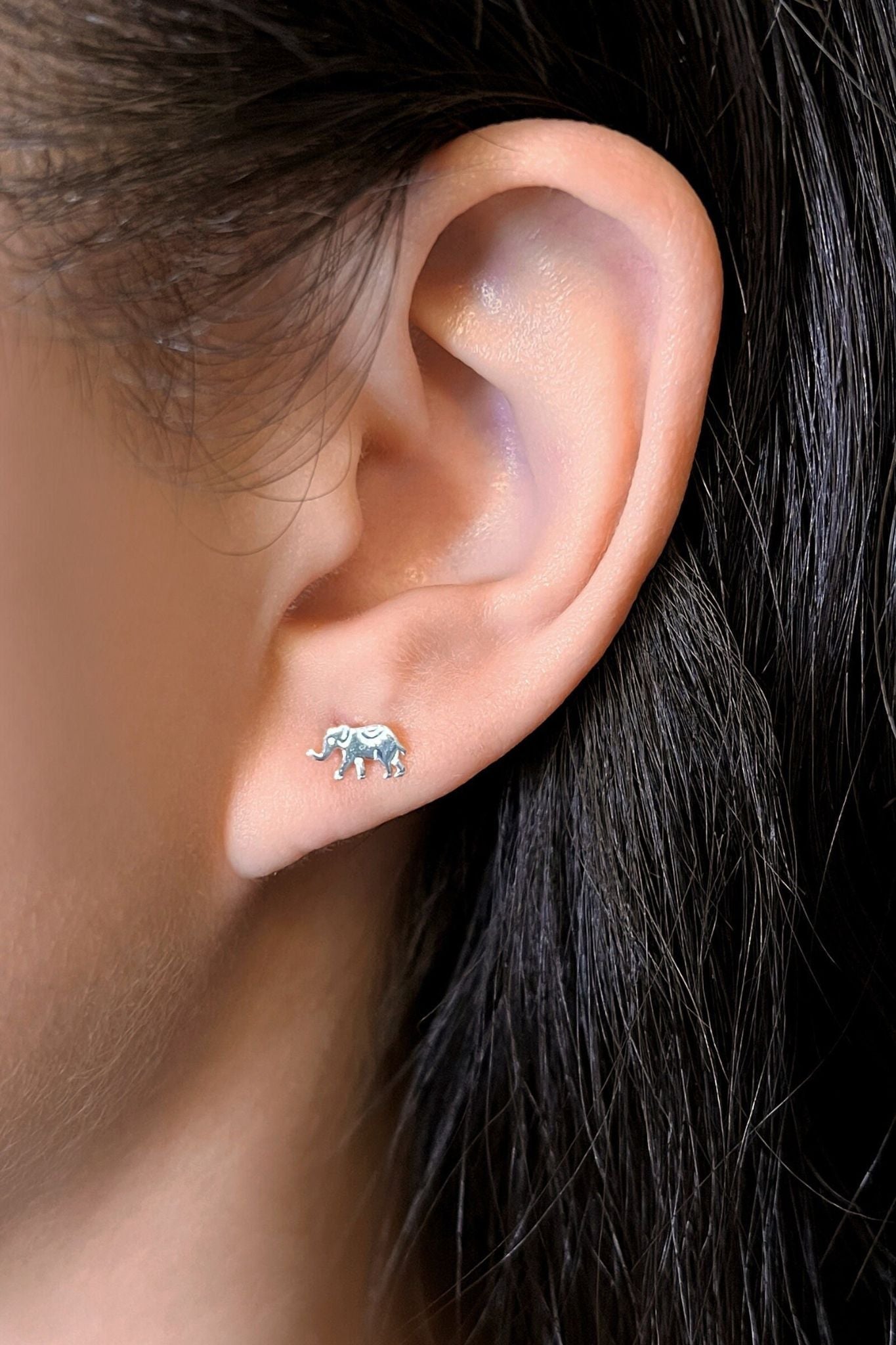 sterling-silver-tiny-elephant-studs-in-silver