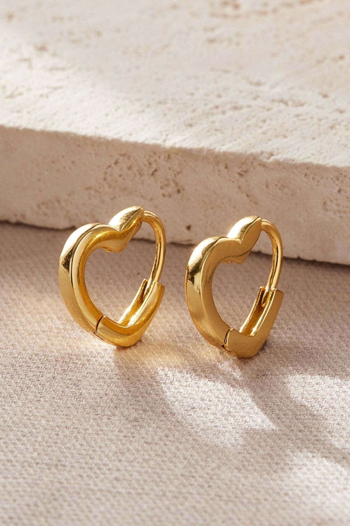 sterling-silver-heart-huggie-hoops-in-gold