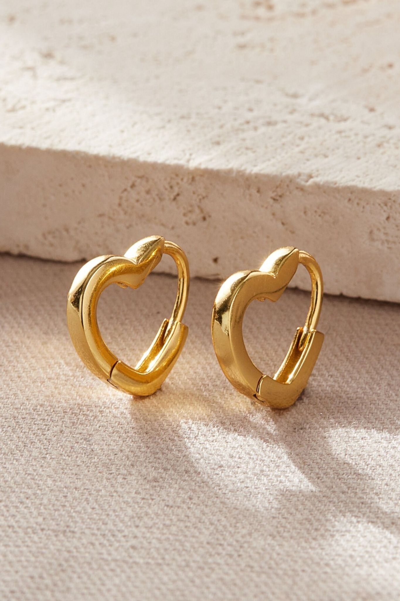 sterling-silver-heart-huggie-hoops-in-gold
