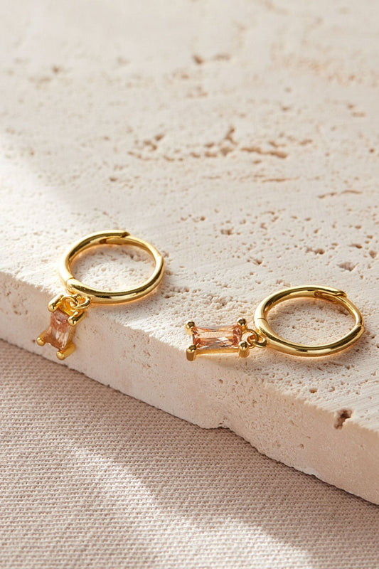 sterling-silver-cz-baguette-hoops-in-gold-peach
