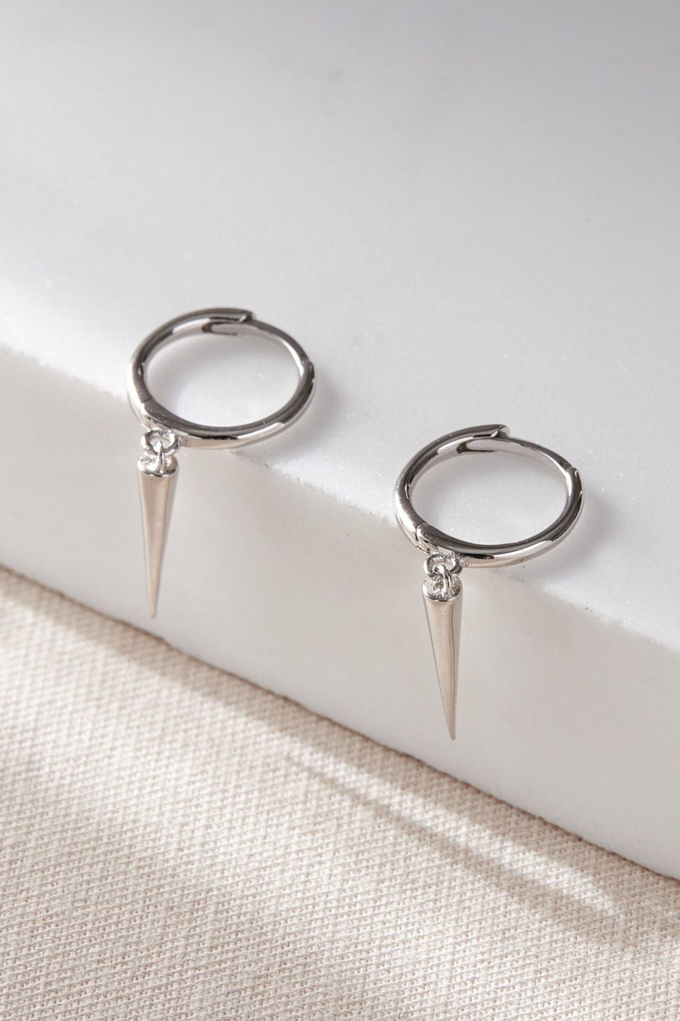 sterling-silver-spike-hoops-in-silver-closeup