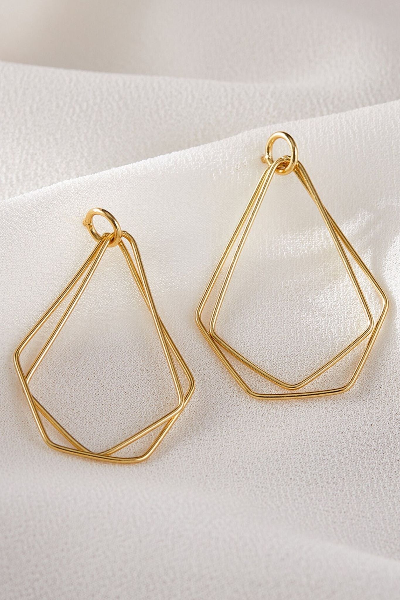 sterling-silver-geometric-drop-earrings-in-gold-closeup