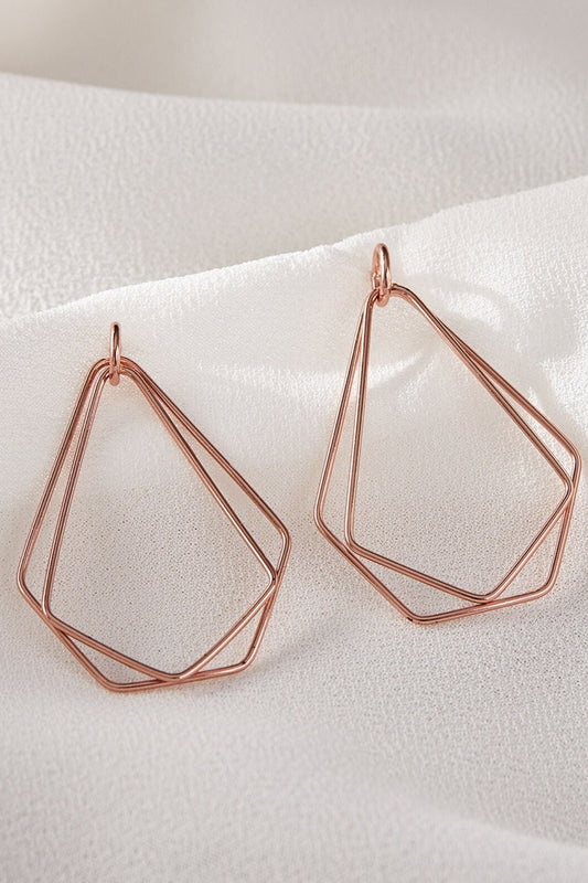 sterling-silver-geometric-dangle-earrings-in-rose-gold-closeup