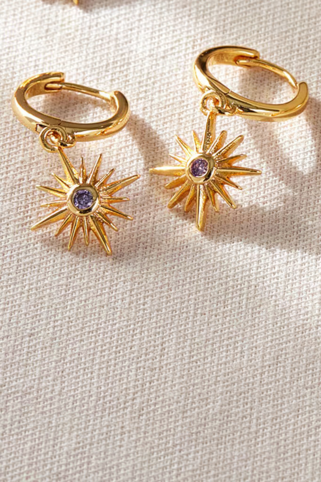 sterling-silver-north-star-hoops-in-gold-purple