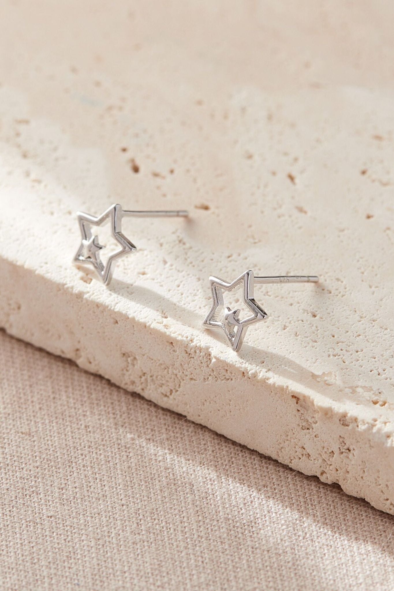 sterling-silver-openwork-dual-star-studs-in-silver