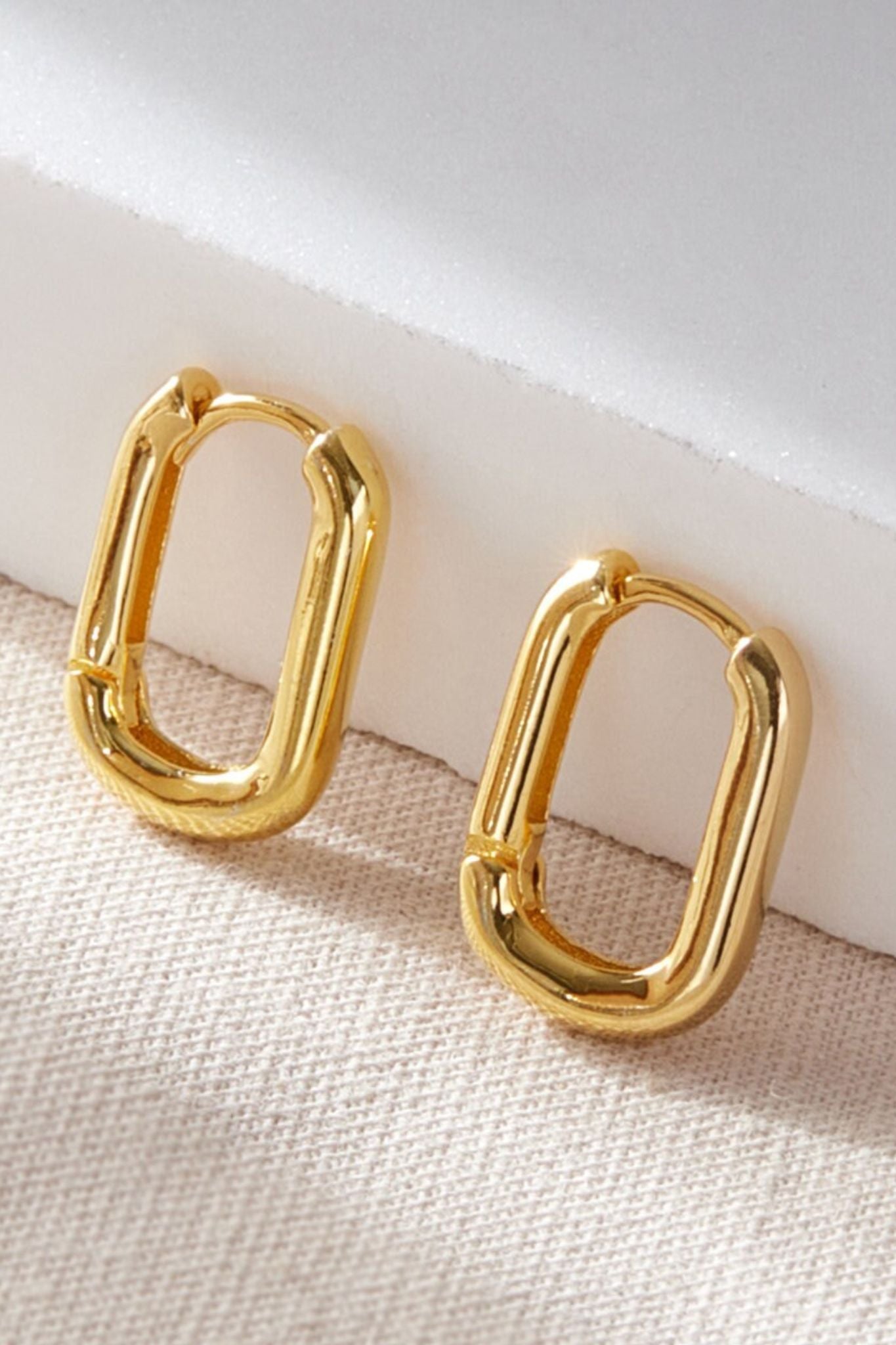 sterling-silver-u-shaped-hoops-in-gold