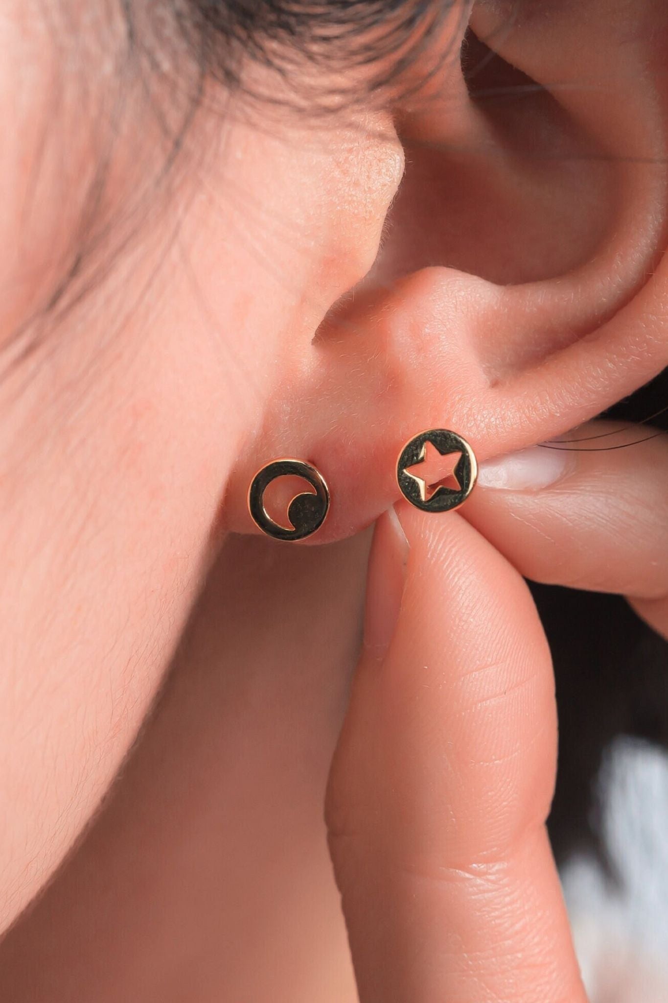 sterling-silver-mismatched-star-moon-studs-in-gold-1-model