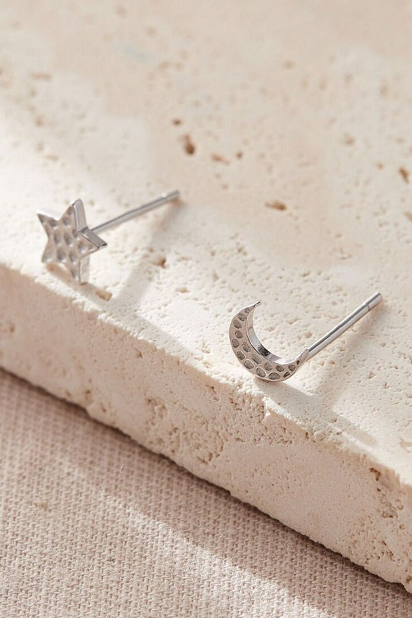 sterling-silver-star-moon-mismatched-hammered-studs-in-silver