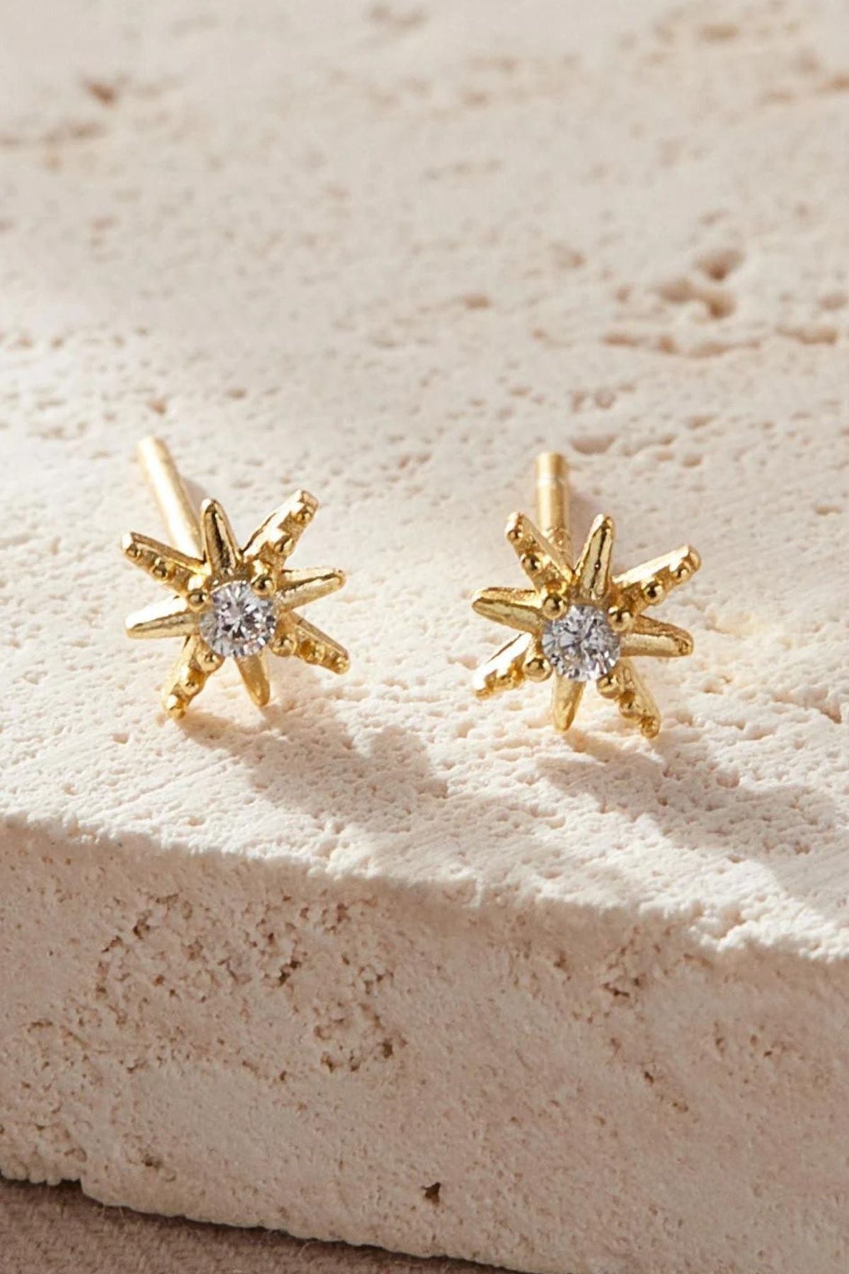 sterling-silver-cz-starburst-studs-in-gold