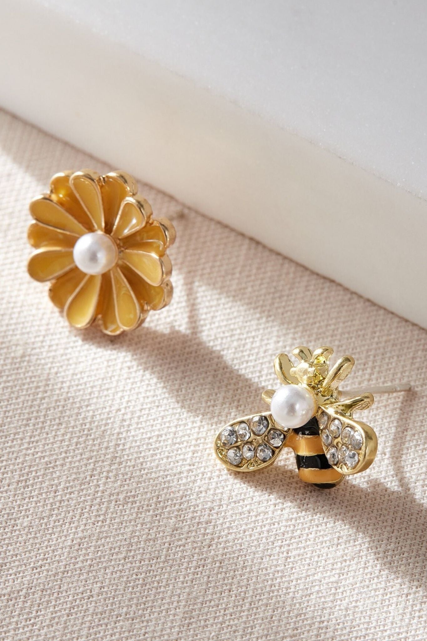 bee-flower-mismatched-studs-closeup