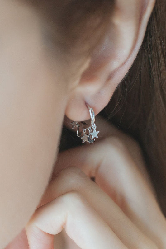 sterling-silver-star-moon-charm-hoops-in-silver-model