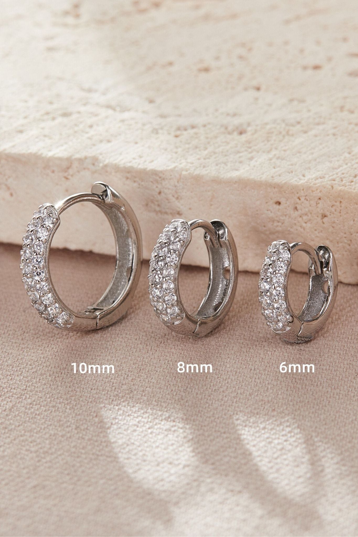 sterling-silver-cz-huggie-hoops-in-silver-various-sizes-sparkly